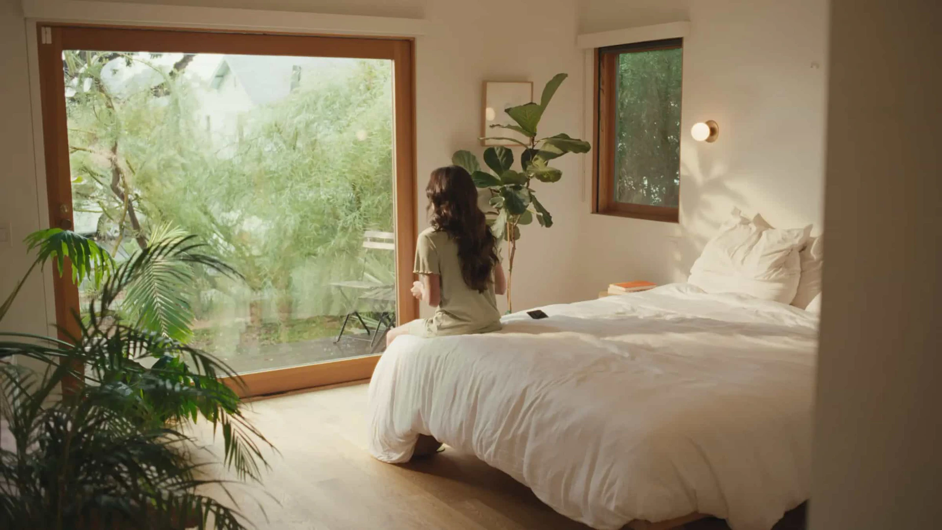 AlterMe product overview with woman in a sunny bedroom